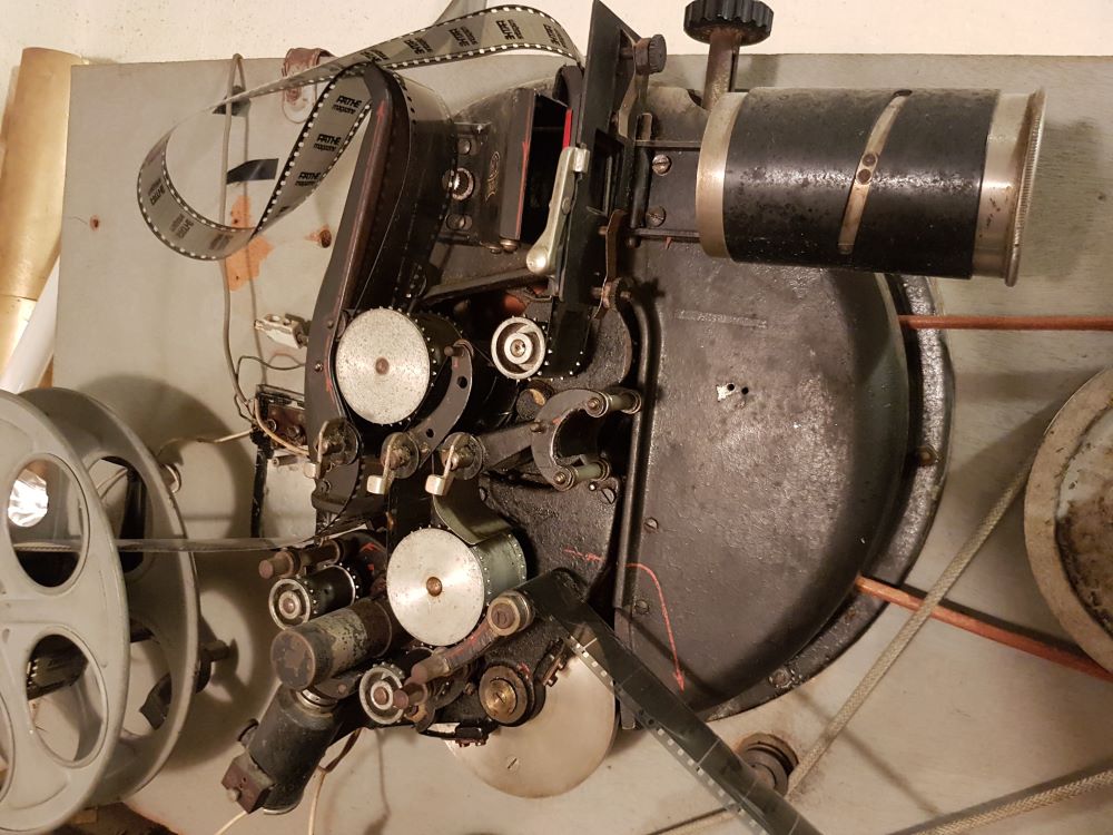 35mm projector in projection room-s